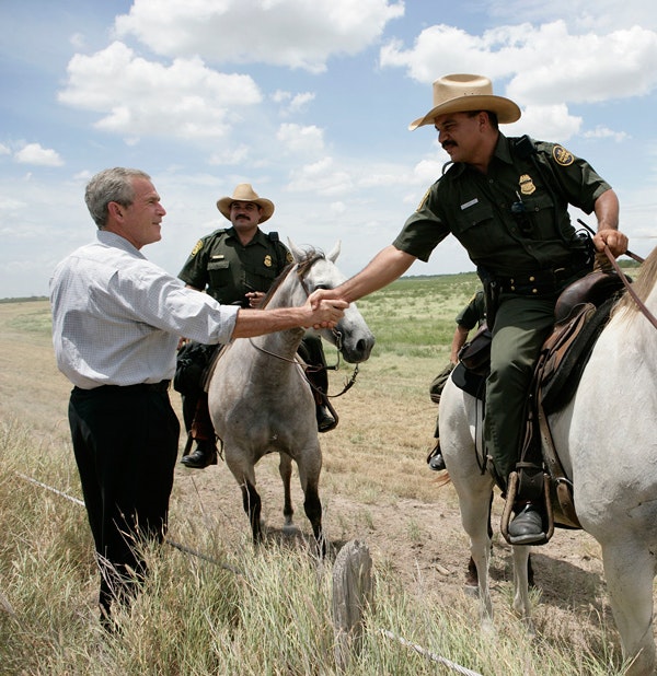 President George W. Bush meets with mounted U.S. Border Patrol agents along the U.S.-Mexico border Thursday, Aug. 3, 2006, in the Rio Grande Valley border patrol sector in Mission, Texas. (Eric Draper / George W. Bush Presidential Library and Museum/NARA)
