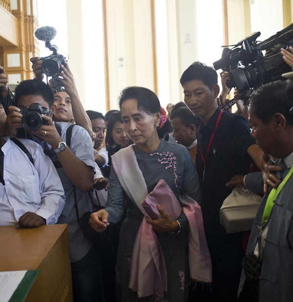 Aung San Suu Kyi arrives for Burma's first parliament meeting after general elections, at the Lower House of Parliament in Naypyidaw on November 16, 2015. (Ye Aung Thu/AFP/Getty Images)