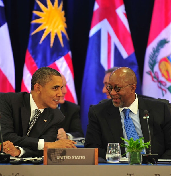 President Barack Obama speaks to U.S. Trade Representative Ron Kirk during a meeting with Trans-Pacific Partnership leaders in Honolulu, Hawaii, on November 12, 2011. 