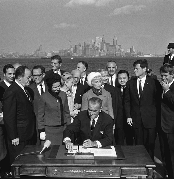 ﻿ President Lyndon B. Johnson signs the Immigration and Nationality Act on Oct. 3, 1965.﻿ (LBJ Library photo by Yoichi Okamoto)