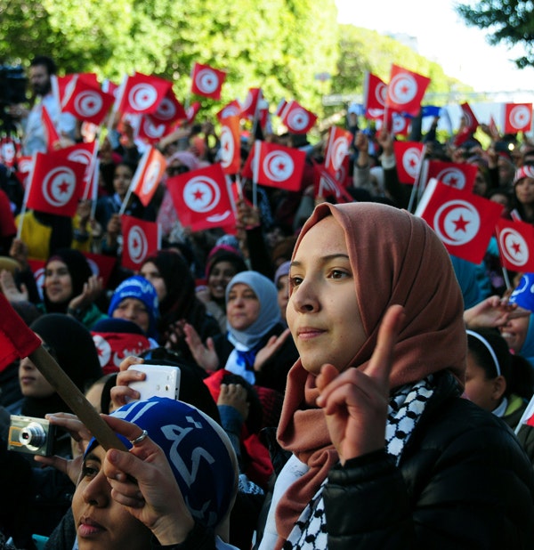 Tunisians celebrate the fifth anniversary of the Arab Spring, Thursday, January 14, 2016 in Tunis. (AP Photo/Riadh Dridi)
