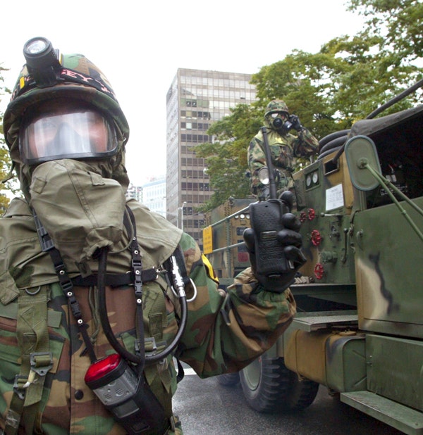 South Korean rescue workers participate in an anti-chemical and anti-biological terror drill on September 15, 2004 in Seoul, South Korea.  (Chung Sung-Jun/Getty Images)