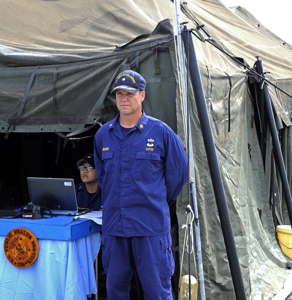 Officers from the U.S. Public Health Service stationed at the U.S. treatment unit for Liberian healthcare workers infected with Ebola. (Zoom Dosso/AFP/Getty Images)